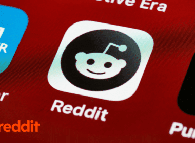 Close-up of the Reddit app icon on a smartphone screen, representing a marketing strategy for boosting SaaS visibility with Reddit upvotes and discussions.