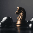 A gold chess knight standing on a chessboard with fallen pieces and a clipboard icon with a magnifying glass, illustrating how to use post-game analysis to spot weaknesses in your chess.