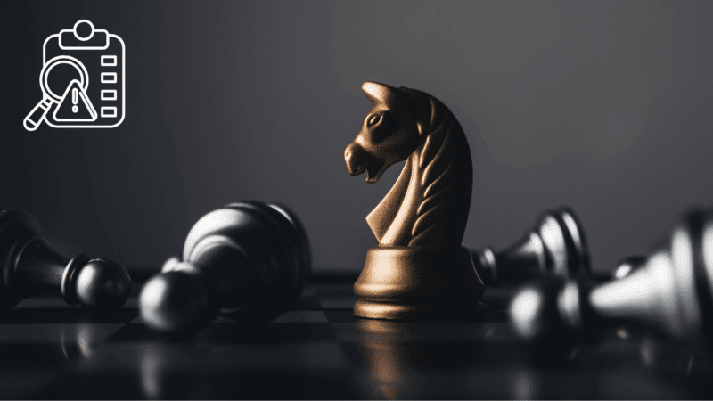 A gold chess knight standing on a chessboard with fallen pieces and a clipboard icon with a magnifying glass, illustrating how to use post-game analysis to spot weaknesses in your chess.