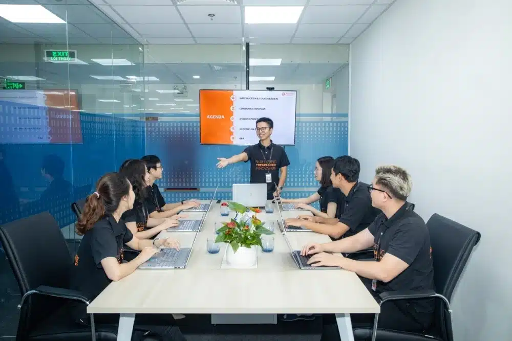 PowerGate Software team reviewing an AI project agenda